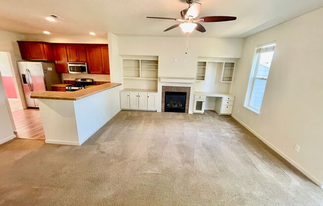 $500 RENT CREDIT! Two Bedroom Townhome with 2 Car Garage, A/C & Private Patio