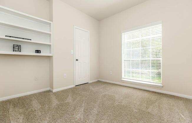 bedroom with built-in shelves