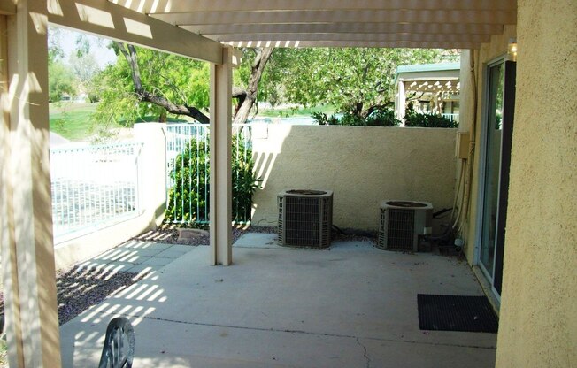 Two master bedrooms in good sized townhome that backs to golf course in Guard gated Painted Desert