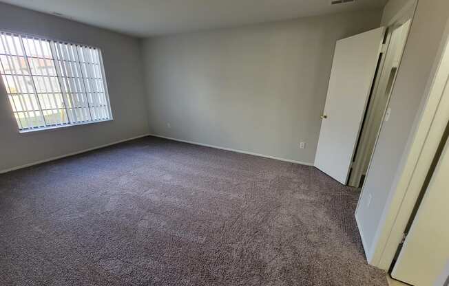 Large and spacious bedroom at Garfield Commons in Clinton Twp, Michigan