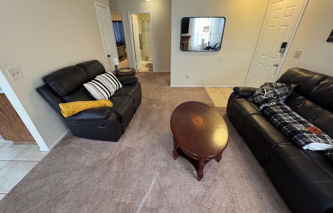 FULLY FURNISHED 2 BEDROOM, 2 BATHROOM FIRST-FLOOR CONDO LOCATED IN THE HEART OF SPRING VALLEY! THIS SPACIOUS UNIT FEATURES A COZY LIVING ROOM WITH FIREPLACE,
