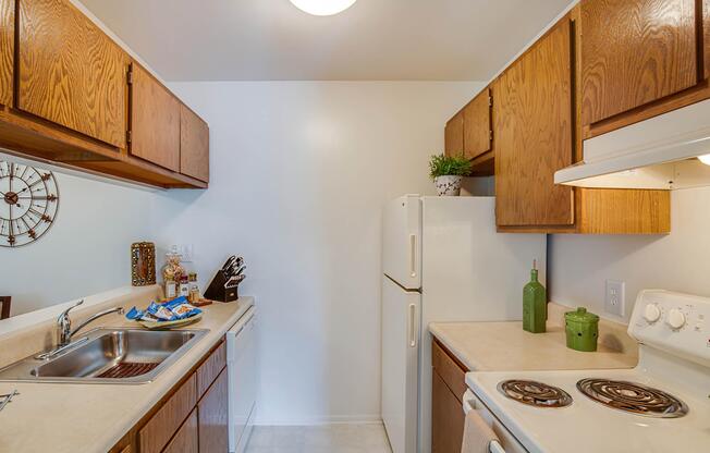 a kitchen with a stove and a sink