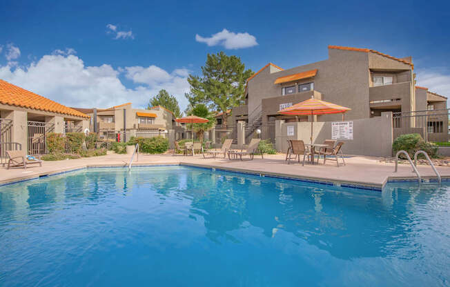 Metro on First Apartments in Tucson, Arizona Exterior and Pool with Lounge Chairs