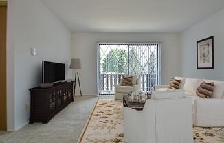 Living Room With Television at Charter Oaks Apartments, Davison