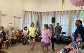 a group of people standing in a room