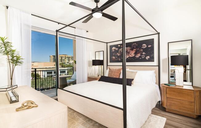 Spacious bedroom layout with large windows and balcony access, offering plenty of natural light and room to personalize your retreat.