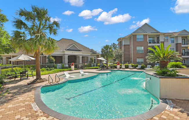 Outdoor Resort Style Pool at Madison on the Meadow Apartments in Stafford, TX 77477