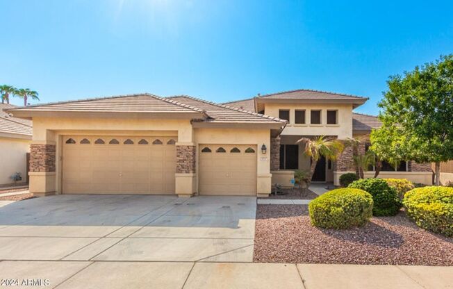 Gated community in Litchfield Park! SOLAR, Pool, and 3 car garage!