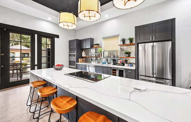 clubhouse kitchen with barstool seating at island