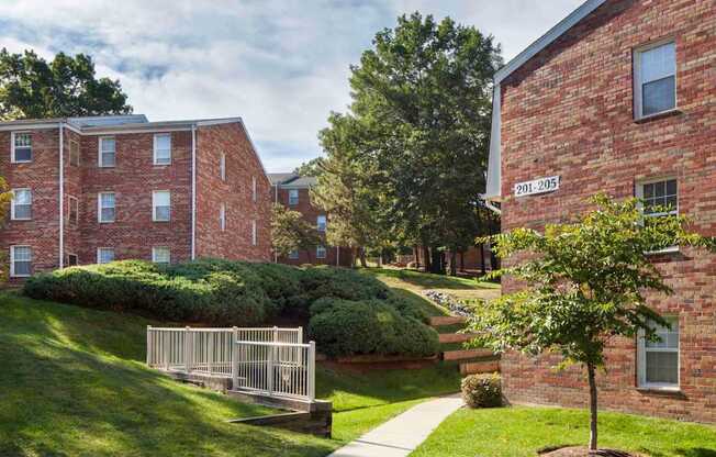 A red brick building with the number 201-205 on it.