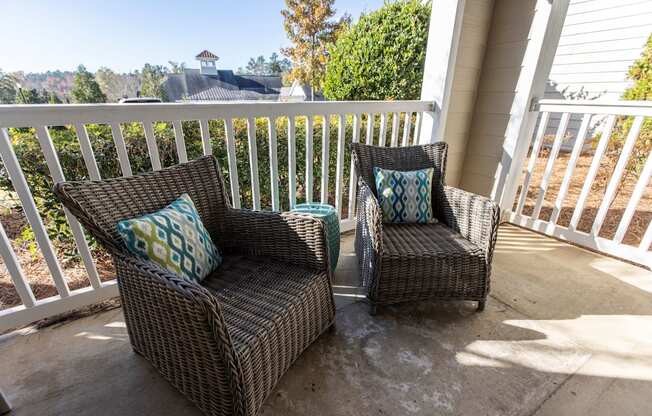 Model patio with two chairs at Ansley at Town Center in Evans GA