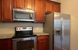 Stylish North Loop Living for $3,499/month plus free one stall garage!