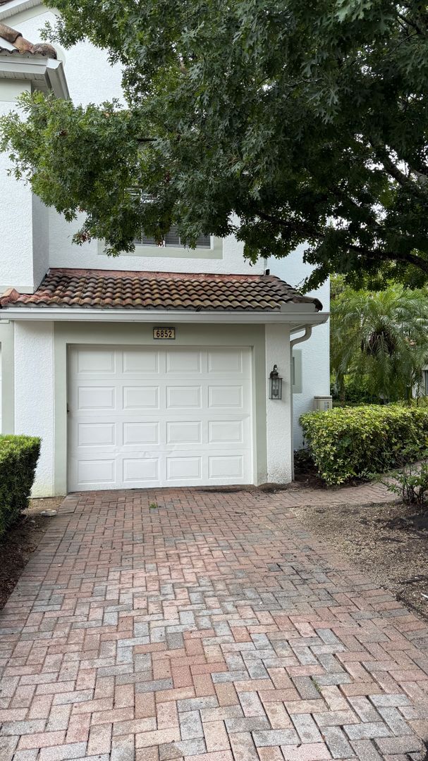 Prime Orlando Location – Gate Community - End-Unit Townhome with Exceptional Curb Appeal!