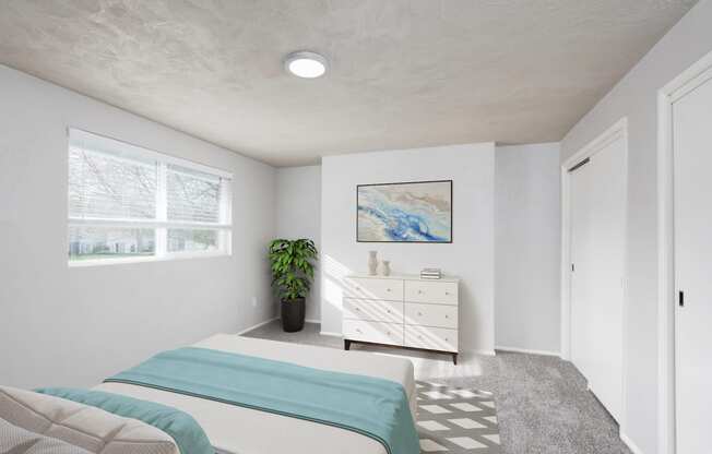 a bedroom with a bed and a dresser