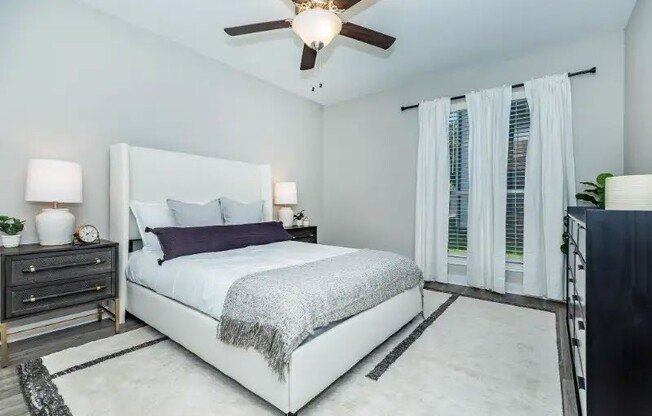 Experience modern living at Cali Crossing Apartments, featuring spacious bedrooms with elegant finishes and ample natural light. Enjoy a serene atmosphere complemented by stylish design. Explore your new home today!