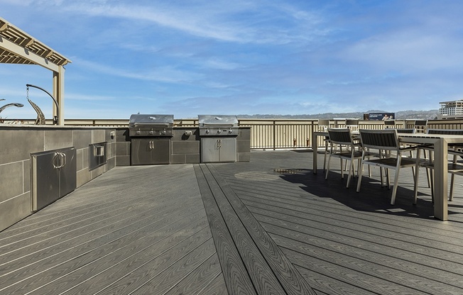 Rooftop BBQ area with seating Oakland Apartments for rent