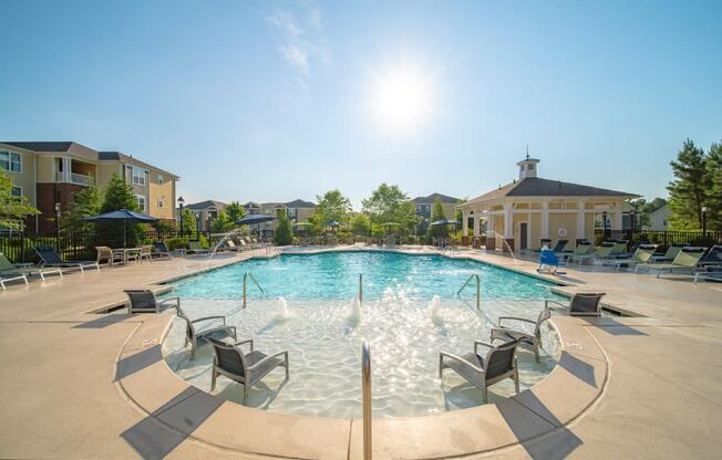 our apartments have a large pool with chairs