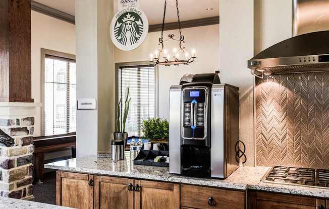 a kitchen with a coffee machine and a counter top