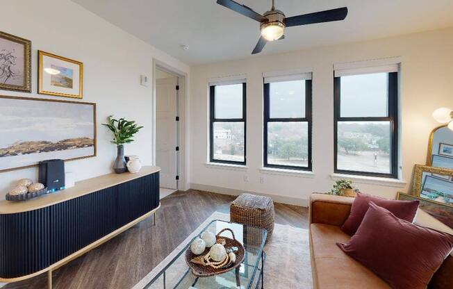 Elevated ceilings and plank-style flooring welcome you home to Modera Katy Trail