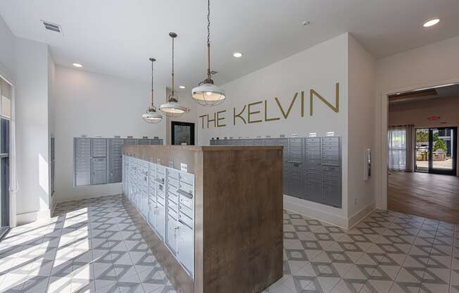 the lobby of the with a reception desk and mailboxes