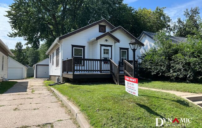 Updated 4+ Bedroom, 2 Bathroom House with Garage and Fenced Backyard