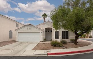 Single story home in gated Seven Hills community with tile in all common areas