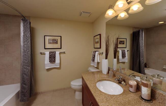Bathrooms with ceramic tile and tub surrounds