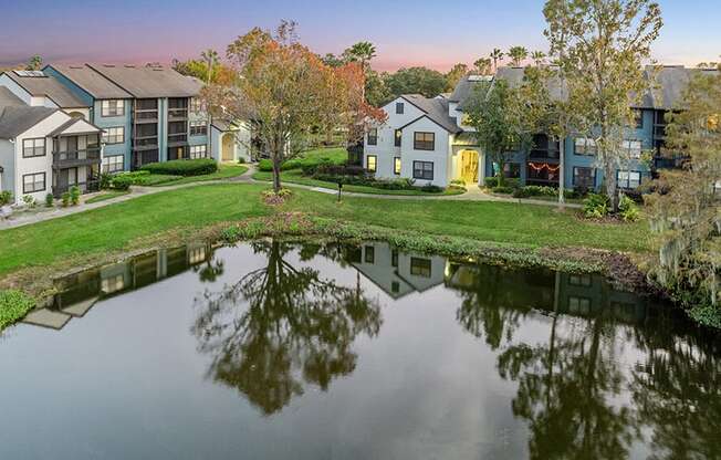 Aerial View of Community Pond and Exterior Building at Fountains at Lee Vista Apartments in Orlando, FL.