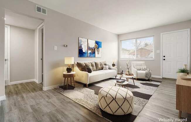 a living room with a couch and a table