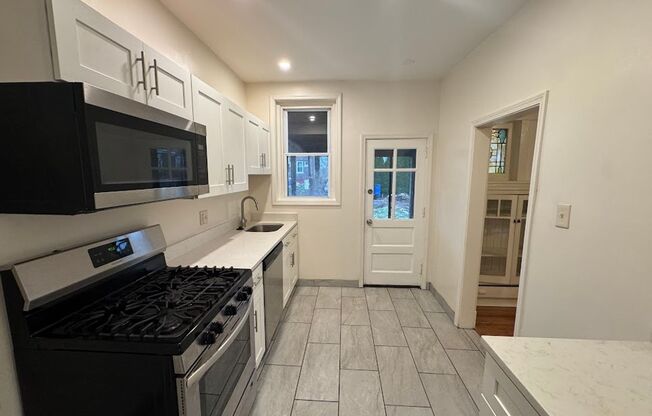 Great Morningside Row House with Front Porch!