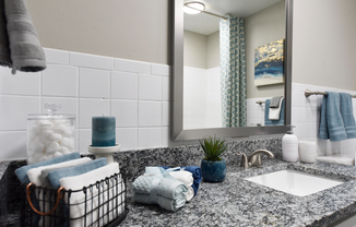 Elevate your daily routine in this chic bathroom space featuring modern design and stylish accents.