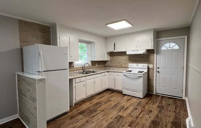 Fantastic Brick Ranch Home that has been refurbished - Open Floorplan with 3 bedrooms & 1.5 baths also convenient to Cherrydale and Paris Mountain!