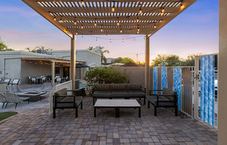 Outdoor Patio Area with Lounge Furniture at Ridgeline Apartments in Tucson, AZ.