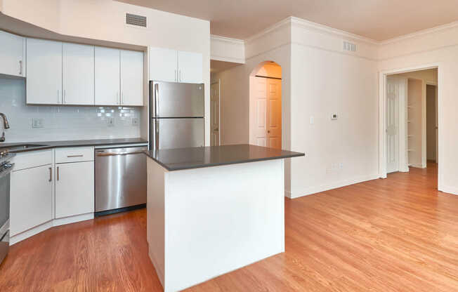 Kitchen with Stainless Steel Appliances and Dining Room