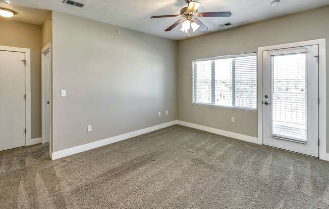 Spacious Living Room with Entry way at Tamarin Ridge in Lincoln, NE