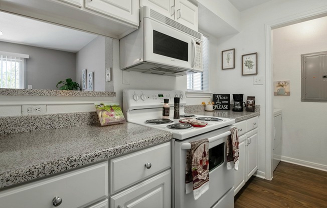 Driscoll Place | Kitchen Counters, Spacious Cabinets, and Ove