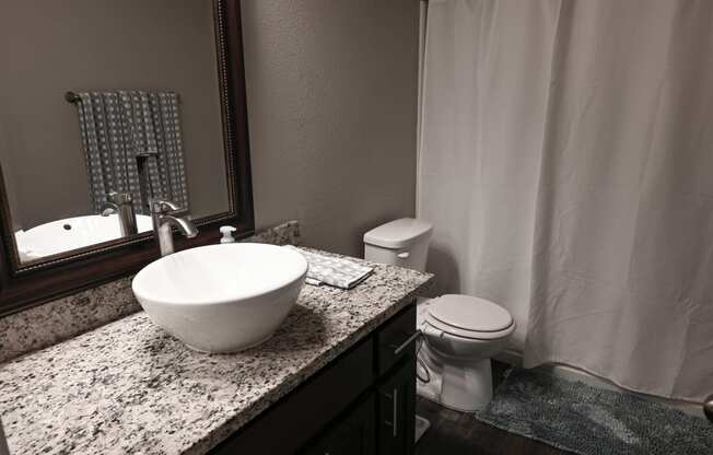 photo of a bathroom with a sink and toilet