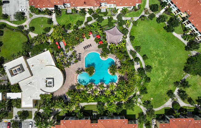 a birds eye view of the resort with a swimming pool