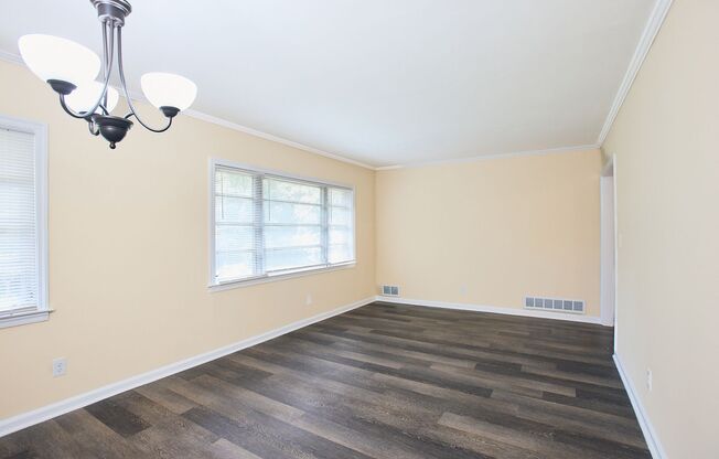 Vintage Charm with Modern Upgrades and Sunroom Living