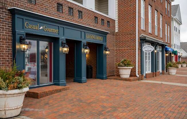 A brick building with a sign that says Casual Gourmet.