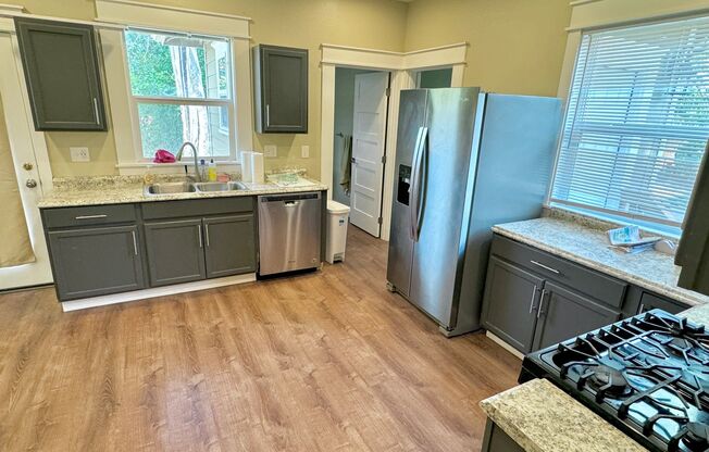 Portsmouth Neighborhood Updated 3-Story Home with Spacious Yard, Finished Basement, LVP Flooring