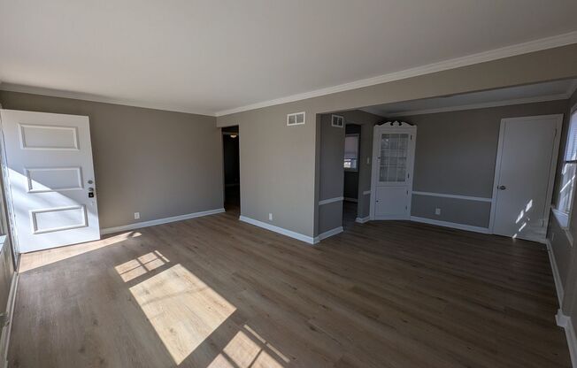 Fully Renovated Home with Sunroom, Garage & Huge Fenced Yard