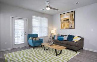 Open concept living rooms with hardwood-inspired flooring