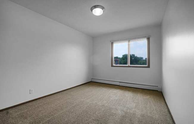 an empty room with a window