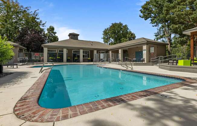the preserve at ballantyne commons pool and building with trees