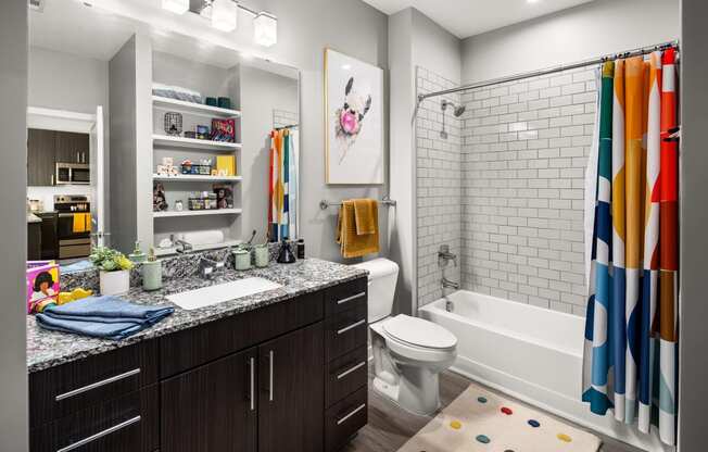 bathroom in a bedroom plus den unit.  at Abberly Noda Vista Apartment Homes, Charlotte, North Carolina