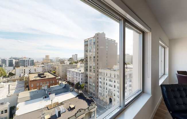 a view of san francisco from an apartment window