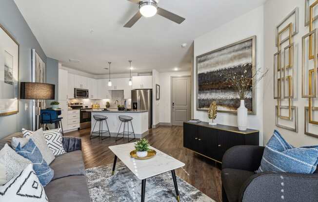 a living room with a couch and a table at LynnCora, Grand Prairie, 75052