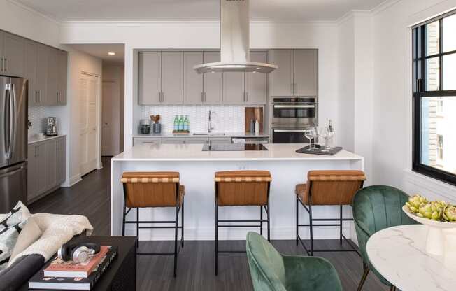 a kitchen with a white counter top and a kitchen island  at The Belden Stratford, Chicago, IL