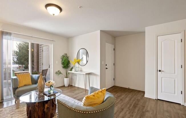 The Crossings at Chapel Hill Living Room with Storage and Private Patio